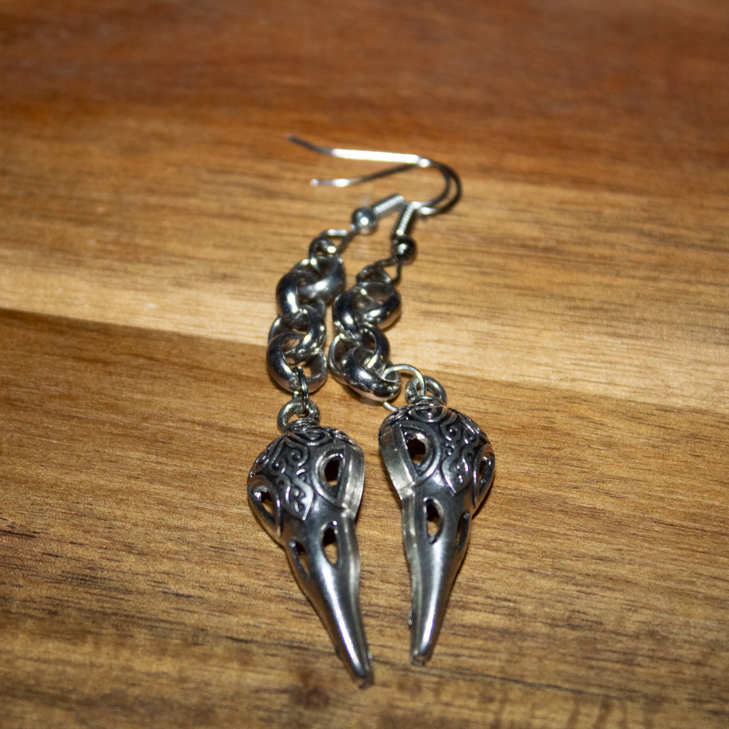 Whispers of the Plague – Raven Skull Dangle Earrings