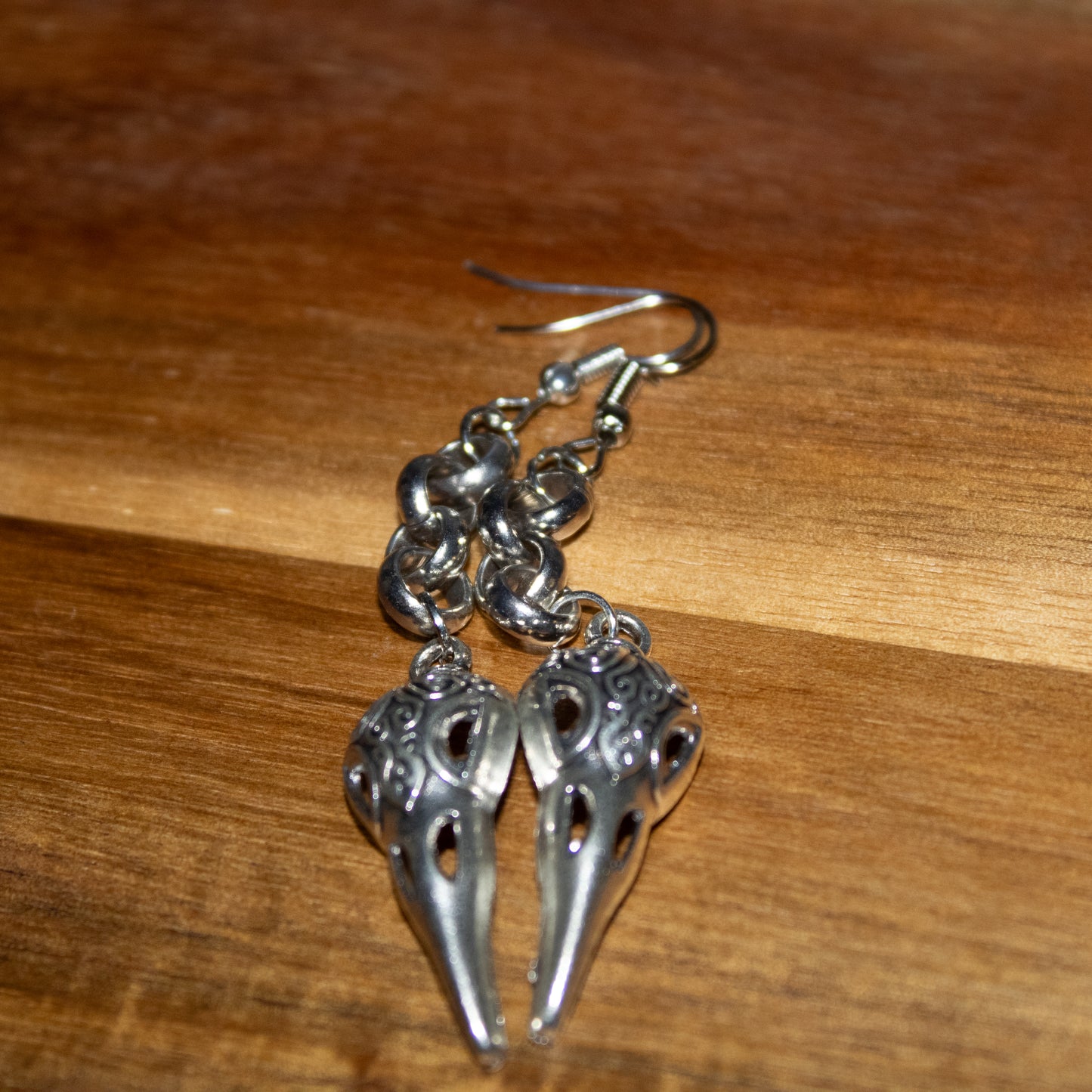 Whispers of the Plague – Raven Skull Dangle Earrings